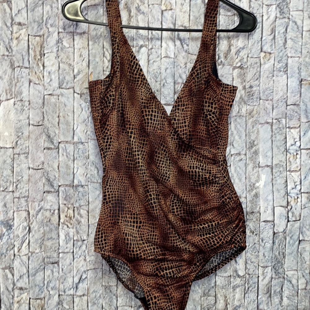 Miraclesuit animal print one piece bathing suit. 14